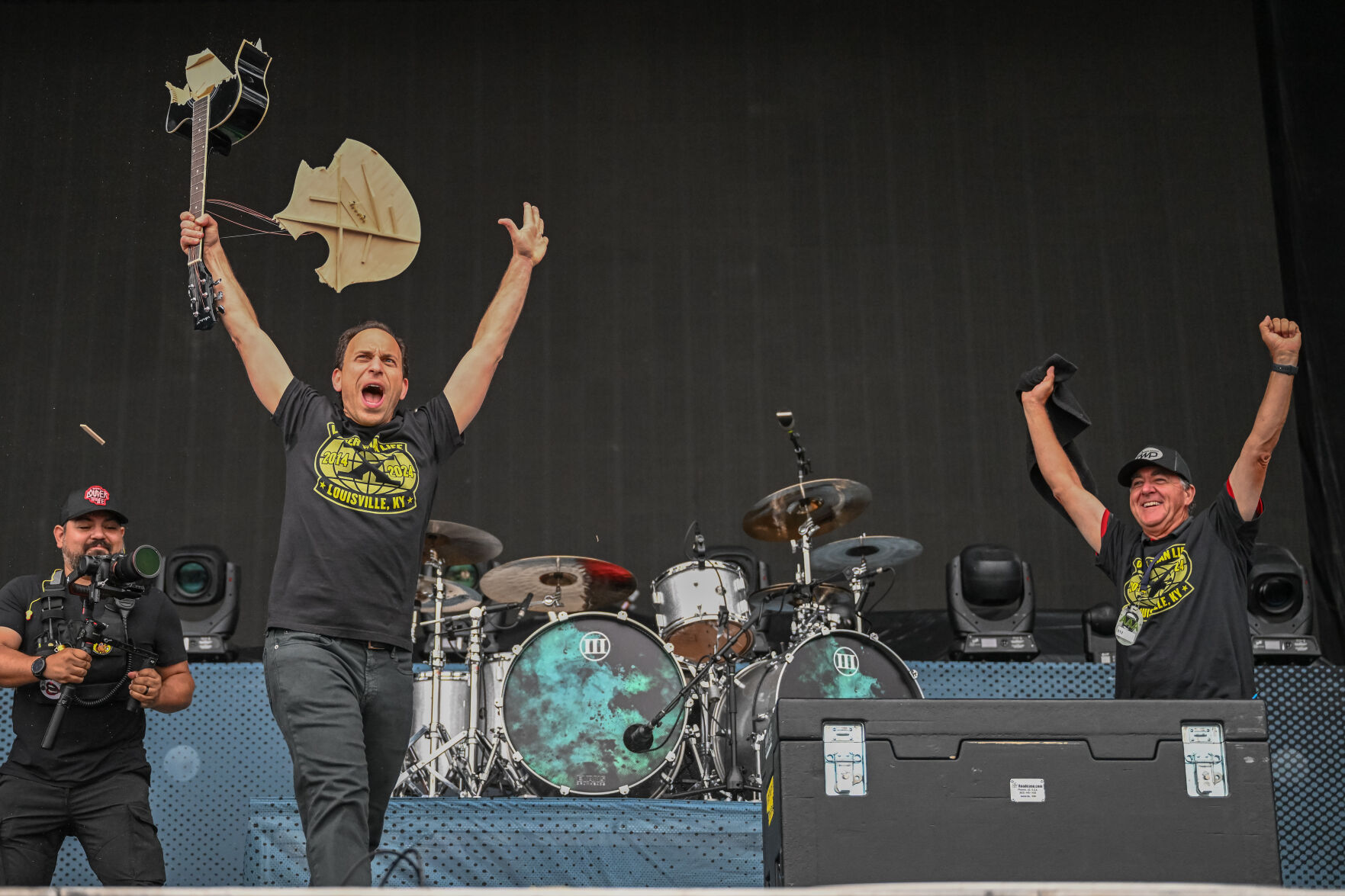 Louisville Mayor Craig Greenberg smashes guitar on Day 1 Louder Than Life 2024